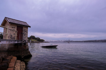 Small hut on a pier by the water
