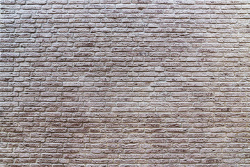 Light burgundy, beige brick brick texture background with small bricks