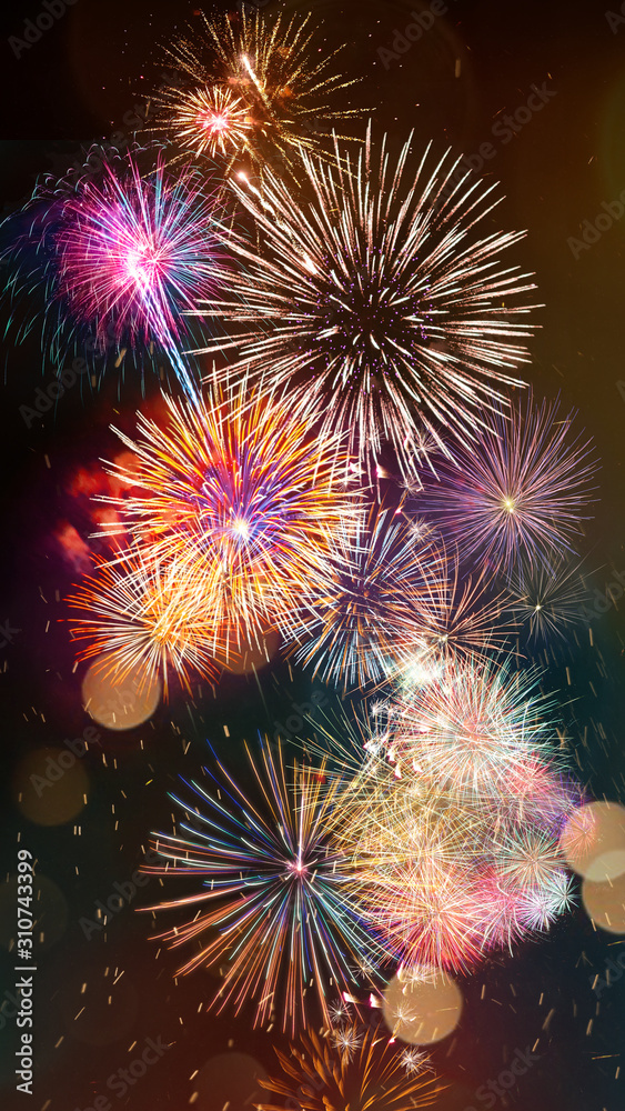 Sticker Colorful firework with bokeh background. New Year celebration, Abstract holiday background