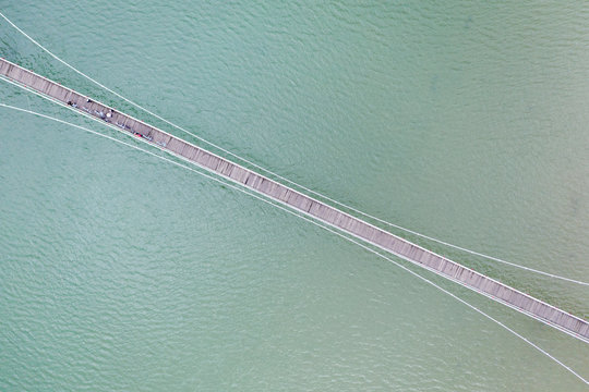 Aerial view of the suspension bridge across the river