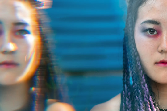 Artistic portrait of asian girl through sfx lens
