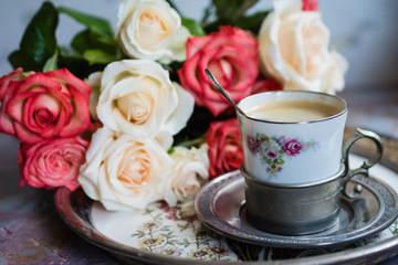 Obraz na płótnie Canvas a Cup of coffee from vintage tableware