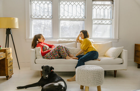 Mother And Daughter Talking At Home