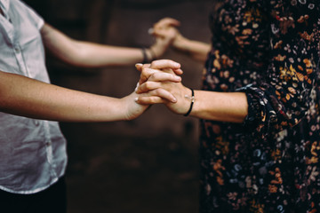 Detail photo of hands holding