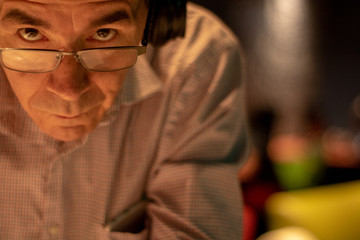 man reading in library