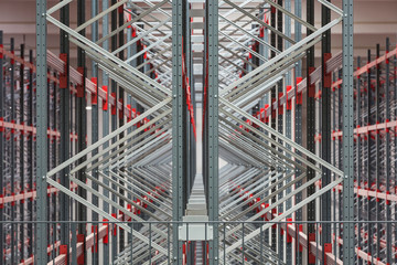 Empty shelves into an industrial warehouse