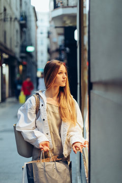 woman looking store windows