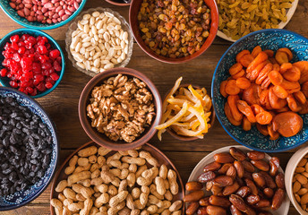 Dried fruits and nuts in ceramic bowls
