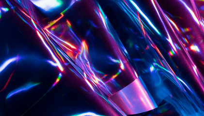 Reflection of light on holographic foils with neon lighting