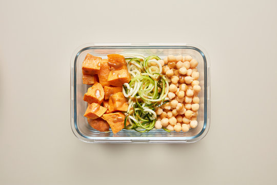Healthy vegetables with dressing in lunchbox