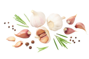 garlic with rosemary, peppercorns and allspice isolated on white background. top view