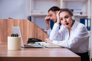 Call center operators working in the office