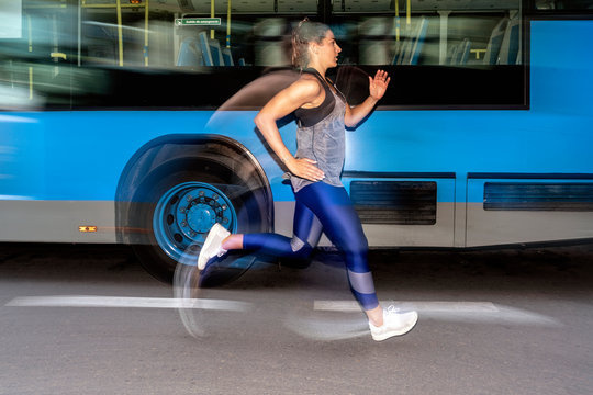 Fitness woman jogging outdoors in the city