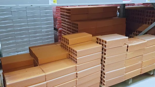 Building material bricks and cinder blocks for houses in stock.