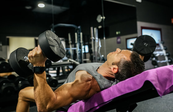 Middle-aged man training in the gym
