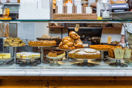 Bakery Counter Exposing Pastries and Cakes