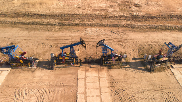 Oil wells in countryside extraction facility