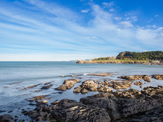 Landscape on the coast of Castro Urdiales, Cantabria, with rocks and horizon line at sea