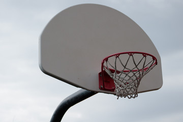 basketball hoop against blue sky