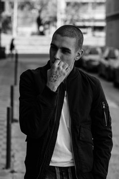 Tattooed man portrait smoking