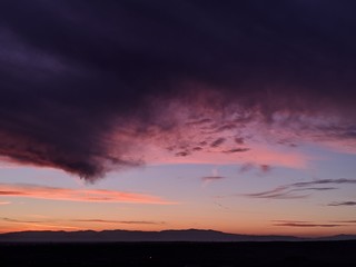 sunset,multi colored,horizon,sky,clouds