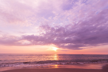 Dyeing the image into purple tones. Beautiful sunset at seascape. Beach area in front of Ban Ta Nuak School Khlong Yai Subdistrict, Khlong Yai District, Hong Kong, Trat, Thailand 23110