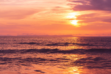 Fototapeta premium Beautiful sunset at seascape. Beach area in front of Ban Ta Nuak School Khlong Yai Subdistrict, Khlong Yai District, Hong Kong, Trat, Thailand 23110