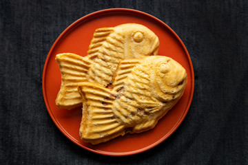 Taiyaki is Japanese traditional fish shaped cake with sweet red bean inside