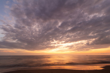Beautiful sunset at seascape. Beach area in front of Ban Ta Nuak School Khlong Yai Subdistrict, Khlong Yai District, Hong Kong, Trat, Thailand 23110