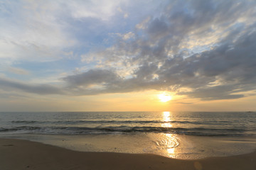 Beautiful sunset at seascape with cloud sky. Beach area in front of Ban Ta Nuak School Khlong Yai Subdistrict, Khlong Yai District, Hong Kong, Trat, Thailand 23110