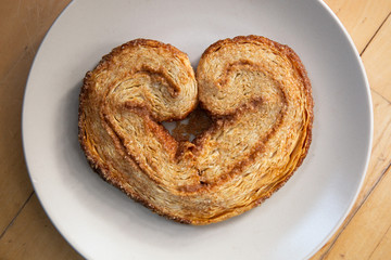 Palmier. A french heart shaped cookie made with puff pastry, butter and crystallized sugar.