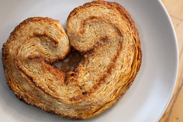 Palmier. A french heart shaped cookie made with puff pastry, butter and crystallized sugar.