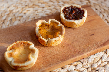 Trio of holiday tarts - pumpkin, mincemeat and butter tart