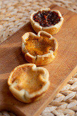 Trio of holiday tarts - pumpkin, mincemeat and butter tart