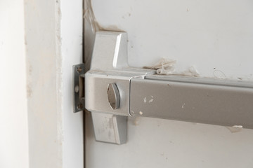 fire exit door handle close-up. selective focus