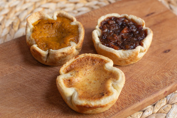 Trio of holiday tarts - pumpkin, mincemeat and butter tart