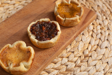 Trio of holiday tarts - pumpkin, mincemeat and butter tart