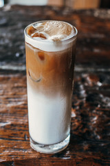 glass of milk on a wooden background