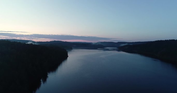Aerial viev of  peaceful morning dawn, before sunrise over the lake in south Norway. (G&aring;sefl&aring;).
