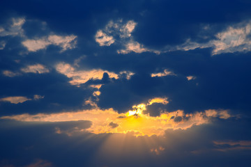Colorful sunset in the evening sky. The nature and beauty of clouds