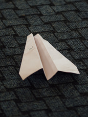 Paper Airplane on the carpet