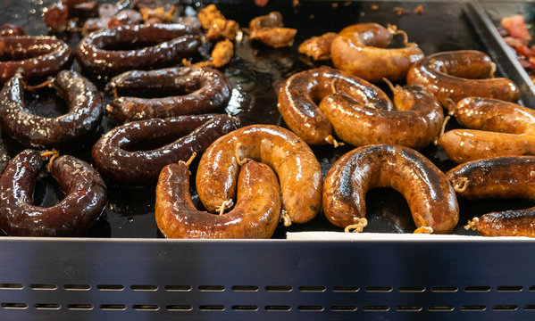 Sizzling Sausages On The Grill