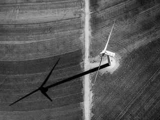 Aerial of wind turbine in a field
