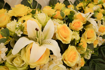 Fake flower and Floral background. rose flowers made of fabric. The fabric flowers bouquet. Colorful of decoration artificial flower