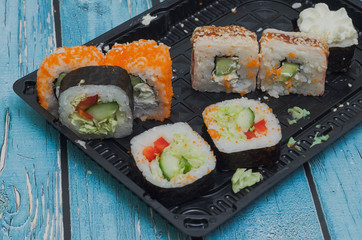 japanese food rolls on wooden background
