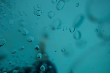 water drops on a blue surface