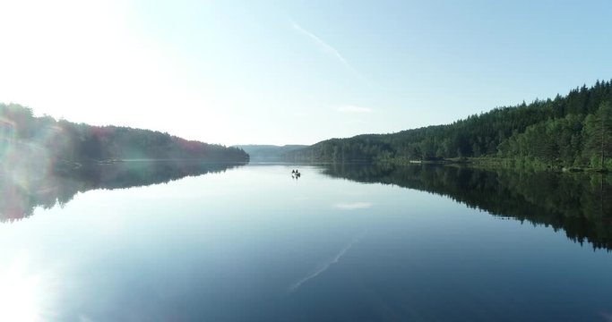 Drone footage of couple enjoing their relaxing canoe trip in south Norway. (Gåseflå)