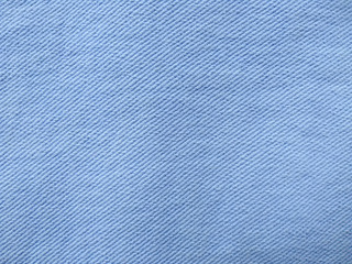 Denim background texture for design. Canvas denim texture. Blue denim that can be used as background. Blue jeans texture for any background. Denim jeans texture.