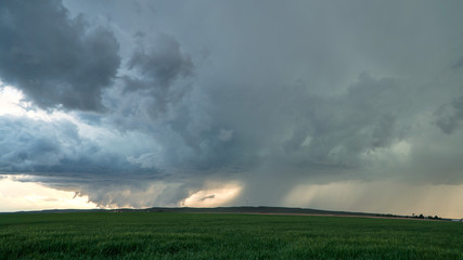 Severe storm circulating trying to form a tornado as clouds spin from severe thunderstorm in Colorado.