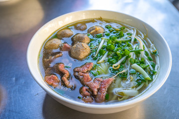Beef and meat ball Pho noodle served with bean sprouts